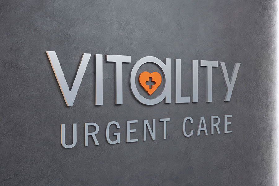 Vitality Urgent Care Reception Desk Logo-Signage Design and Production